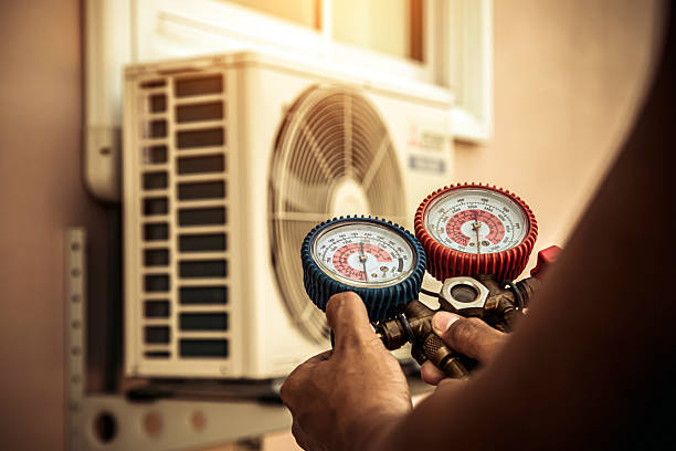 Professional Hvac technician working in Webster, MA